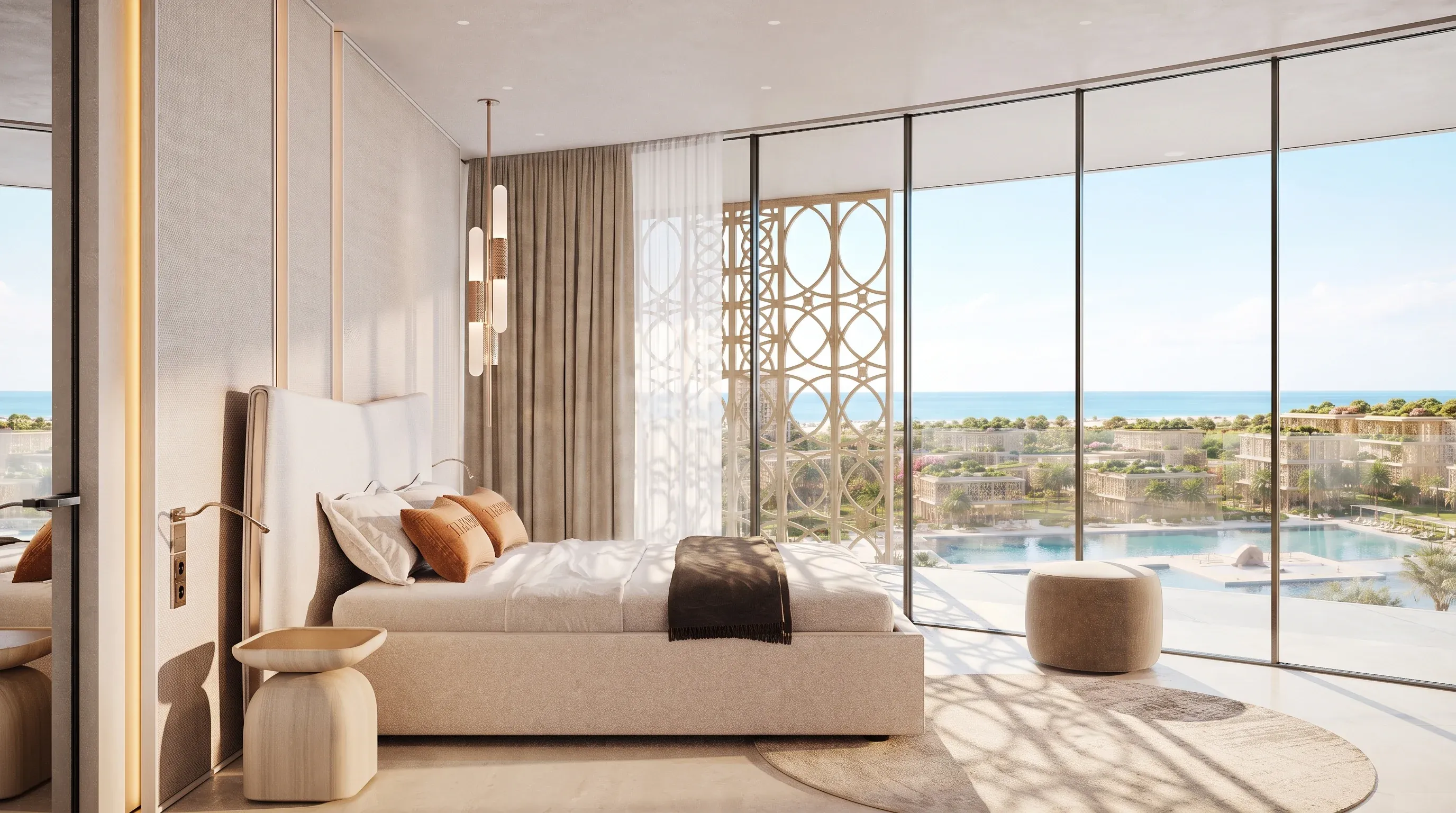 A furnished bedroom at Mira Ocean Estates opening onto a terrace above the lagoon