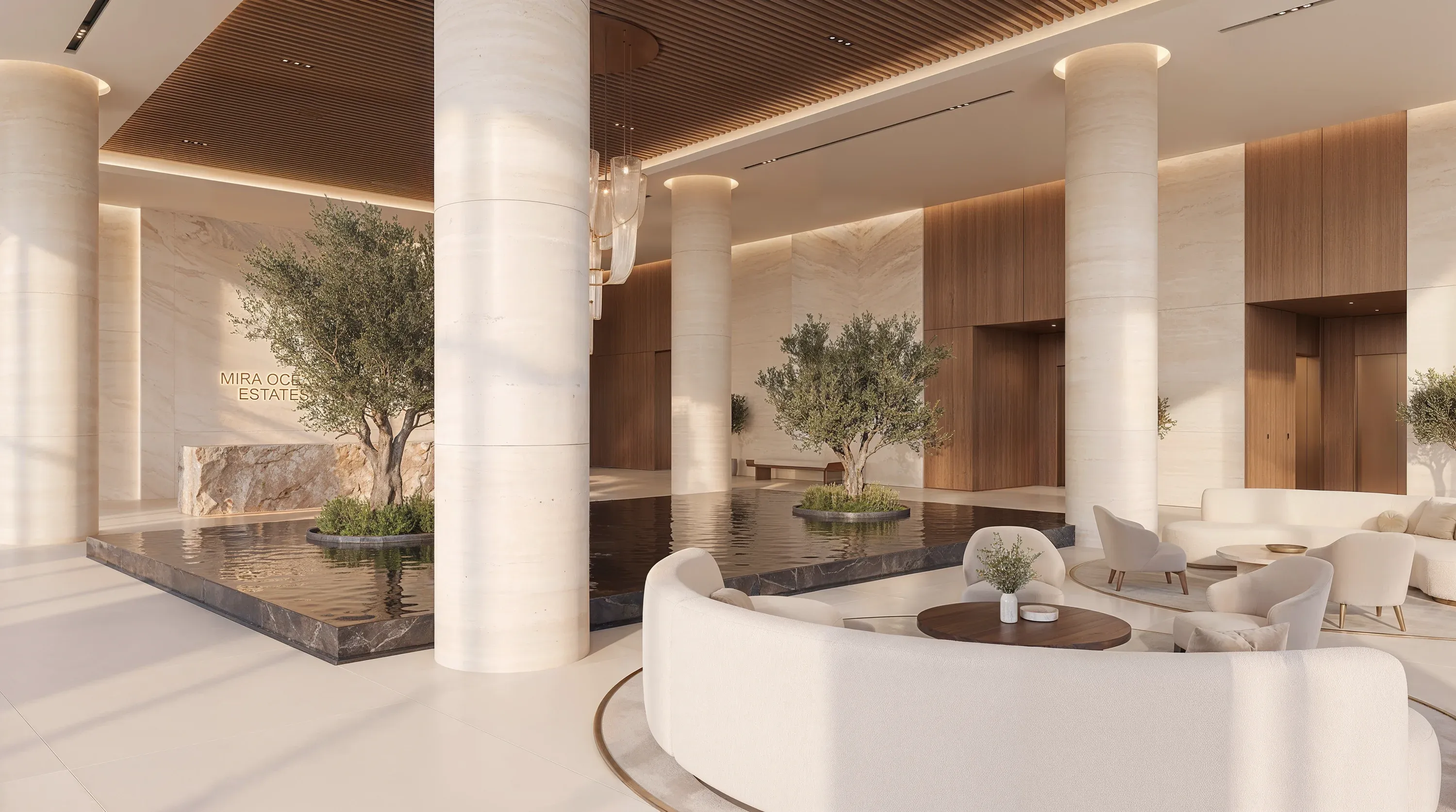 The colonnaded lobby at Mira Ocean Estates, its still water and olive trees